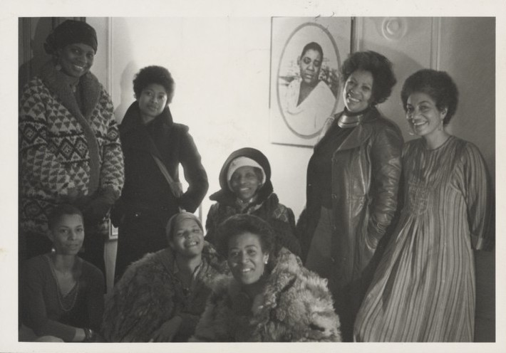 The Sisterhood Members, 1977. (front row from left) Nana Maynard, Ntozake Shange, Louise Meriwether (back row from left) Vertamae Smart-Grosvenor, Alice Walker, Audrey Edwards, Toni Morrison and June Jordan.
