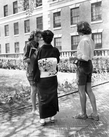 Students on Campus wearing Bermuda shorts, one of the era's sartorial trends. c.1962. Photograph by The New York Daily News, courtesy of the Barnard College Archives.